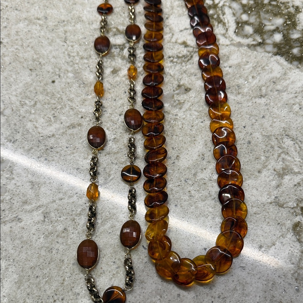 Long Amber colored necklaces